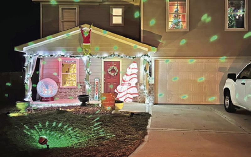 THE SWEATONS WERE awarded second place in the residence category of Snook EEA’s “Christmas Lights of Snook.”
