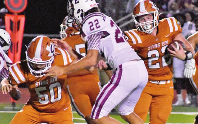 LARAMIE PIEPER CARRIES the ball for Caldwell against Cameron.