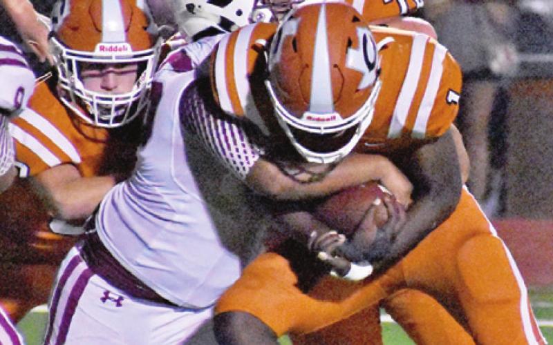 CALDWELL’S JAMAR HEWITT fights through this Cameron defender.
