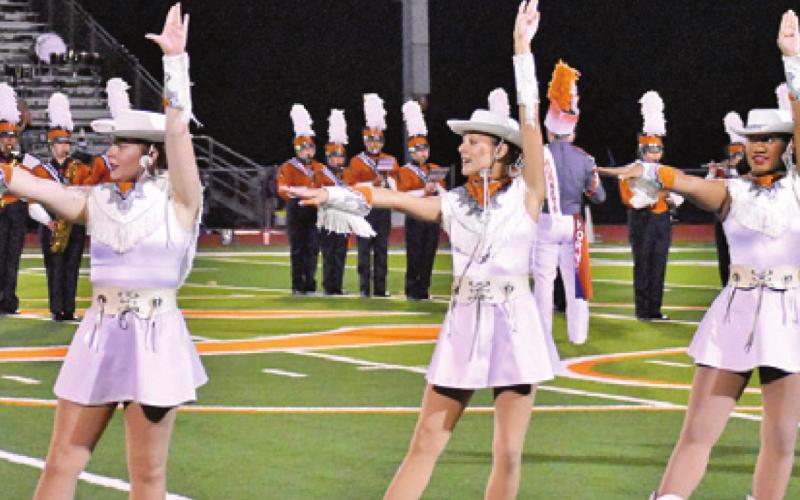 THE CALDWELL HIGH School Honeybees perform on Friday. They include Abigail Easterling, Whitney Hodges and Zaria Wilson.