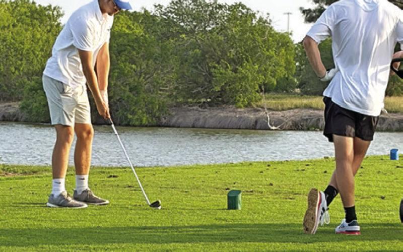 ALBERTO NORWOOD PREPARES for this shot at the regional tournament last week at Gabe Lozano Golf Course in Corpus Christi.