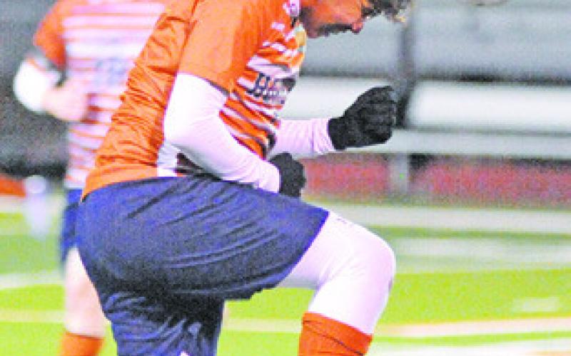 JOSE ALVARES HEADS the ball during Caldwell’s win over Smithville last Friday night.