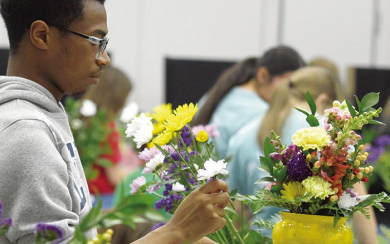 BEAUTIFUL FLORAL arrangements were prepared during Tuesdays Young Florists of Texas Competition at the Caldwell Civic Center. Tribune photo by Denise Squier