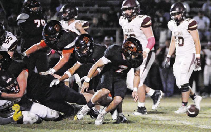 THE BALL IS FREE for Somerville defenders in the Milano game. Pictured are Colt Holton, Kaleb Leang and Martin Espinoza. Tribune photo by Denise Squier