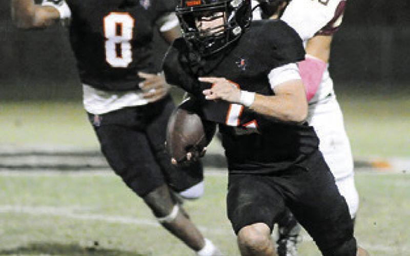 COLT HOLTON of Somerville carries the ball in the Yeguas win over Somerville. Tribune photo by Denise Squier