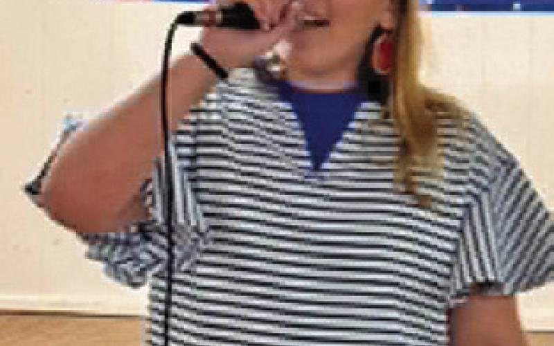 MARLEY KOCUREK sang the National Antthem on Saturday, July 4, at the Hermann Sons Life Hall in Deanville.