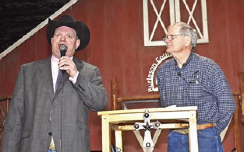 BURLESON COUNTY Extension Agent John Grange introduces Nathan Ausley.