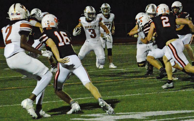 COY BECKA OF Caldwell runs with the ball against Smithville in a 49-34 victory. Tribune photo by Sabine Lazo