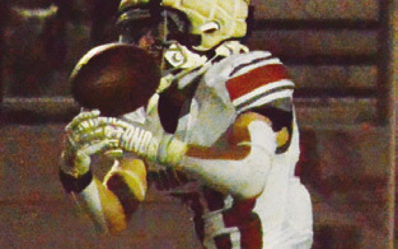 BRAXTON FRITCHER catches the ball for Caldwell in the Hornets’ win at Smithville. Tribune photo by Sabine Lazo