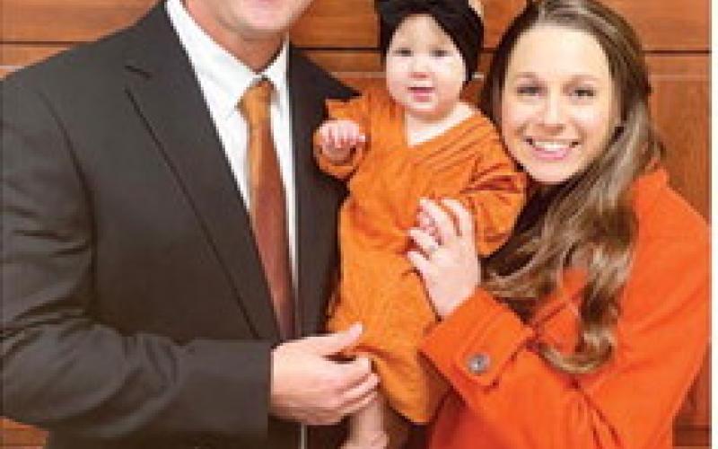 LUKE KLINGLER was recently named the new Yegua head football coach and athletic director. He is pictured with his daughter Landry and his wife Morgan.