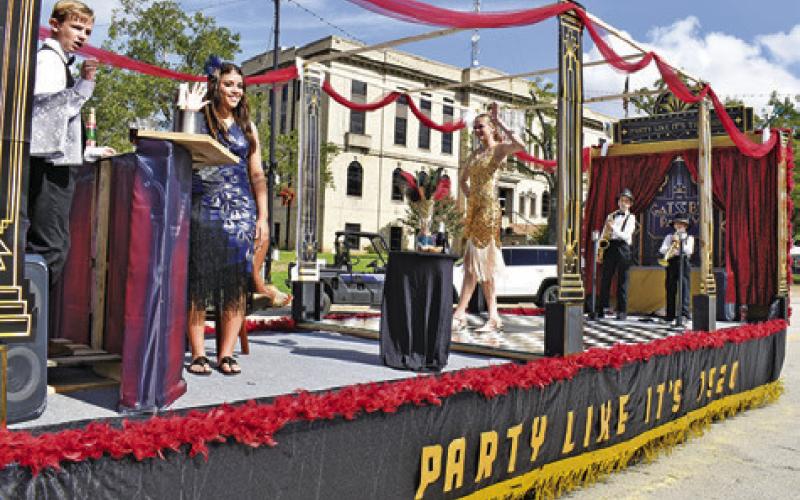QUEEN CANDIDATE DAKOTA Kienow won the Queen’s Category for her 20s inspired float featuring the fair’s “Decades of Fun” theme in last Saturday’s Burleson County Fair Parade. (See story inside.) Tribune photo by Roy Sanders