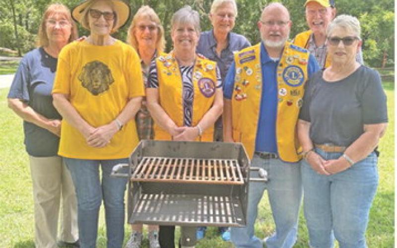 THE CALDWELL BURLESON COUNTY Lions Club donated 10 charcoal grills made by the Caldwell High School Ag shop welding class to the Harry Hejl City Park. Making the presentation are Lions, Scarlette, Pat, Cindy, Jacque, Robin, Ken, Bob and Kathy. Photo courtesy of Lion Adrien Drouilhet
