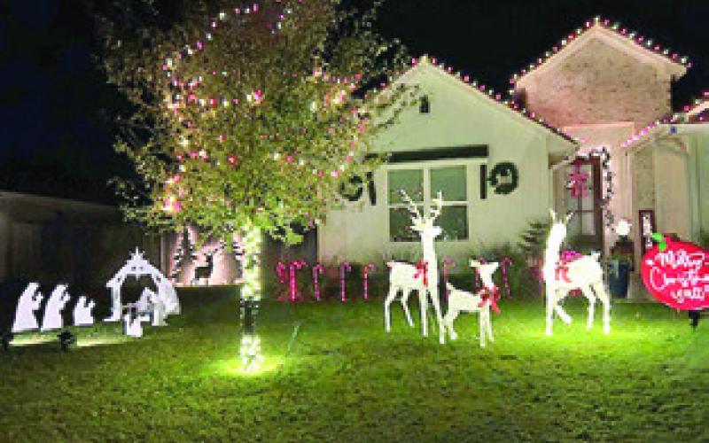AN HONORABLE mention award in the residence category of the Snook EEA Christmas Lights of Snook contest is at 220 Pleasant Path.