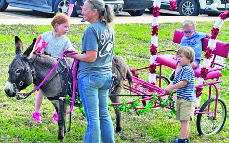 CHILDREN WERE ABLE TO enjoy wagon rides at the Harrie P. Woodson Memorial Library’s “Miracle on Main” at the Caldwell Civic Center.