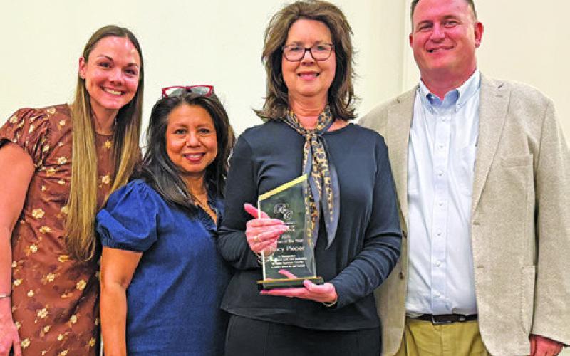 TRACY PIEPER WAS NAMED the Burleson County Chamber of Commerce’s Woman of the Year at last week’s chamber banquet. Tribune photo by Denise Squier