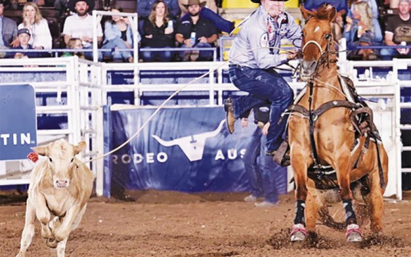 WESTYN HUGHES and his horse Zanna compete at Rodeo Austin in Tie-Down Roping.