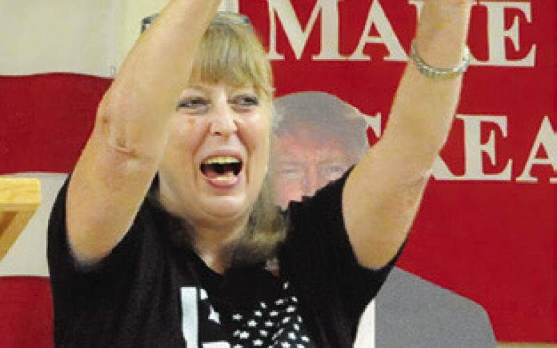 KAREN BOLT, Chair of the Republicans of Burleson County, fires up the crowd attending last week’s MAGA/Trump rally. Tribune photo by Denise Squier