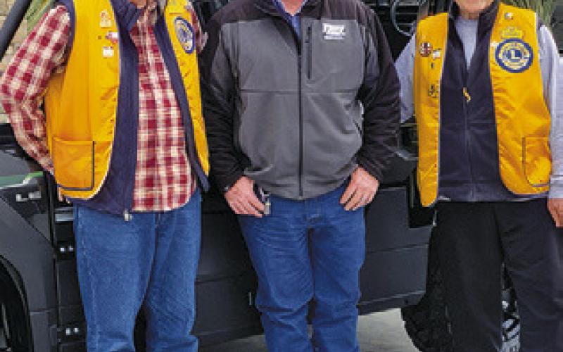 DONNIE CALHOUN (center)won the Grand Prize in the Caldwell Men’s Lions Club raffle. Also, pictured are Tony and Sal Zaccagnino.