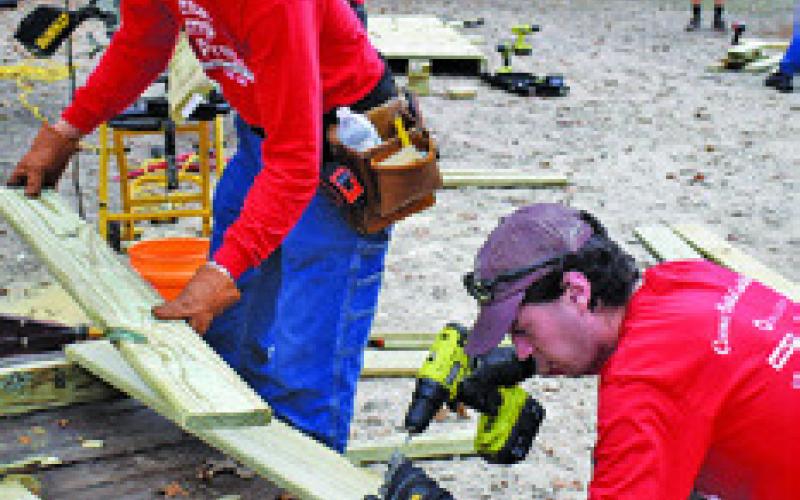 A RAMP IS built at this home off Park Road 57 thanks to these volunteers.
