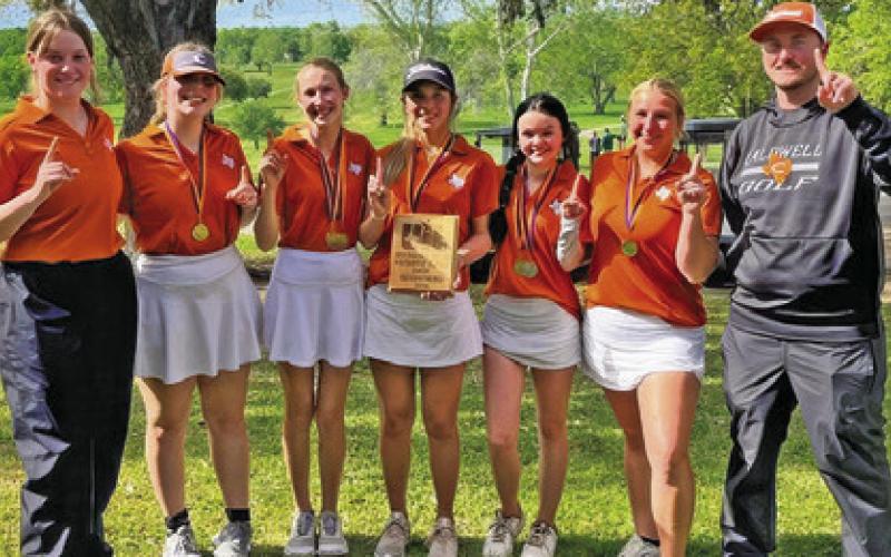 CALDWELL GIRLS GOLF team members include, from left, Allison Krueger, Sarah Boniol, Madilyn Schneider, Ciara Coker, Kate Hill, Tanzley Johnson and Coach Jacob Schaefer.