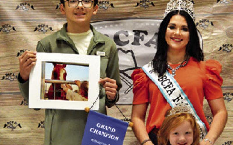 ETHAN RAMIREZ WON GRAND IN Senior Photography. Also pictured are Fair Queen Kodi Hitchcock and Little Miss Taytum Hohlt. Tribune photo by Sabine Lazo
