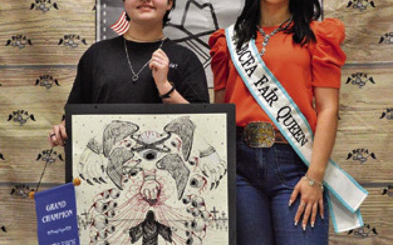 OLLIE ETHERIDGE WON GRAND in Senior Art. Also pictured is Fair Queen Kodi Hitchcock. Tribune photo by Sabine Lazo