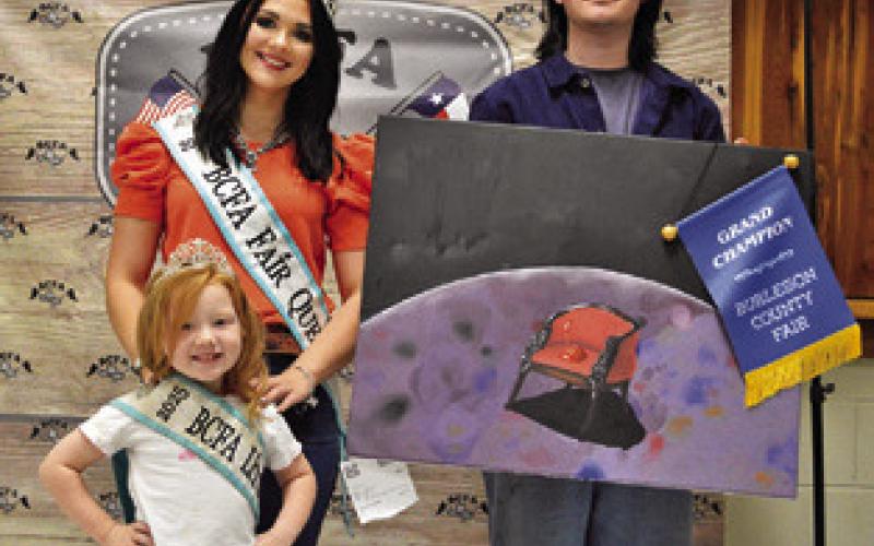 DONOVAN SHERWOOD WON GRAND in Senior Art, oil. Also pictured are Fair Queen Kodi Hitchcock and Little Miss Taytum Hohlt. Tribune photo by Sabine Lazo