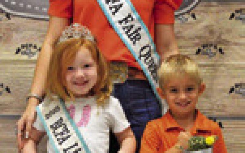 LEDGER LANDOLT WON GRAND IN Children’s Corner Horticulture. Also pictured are Fair Queen Kodi Hitchcock and Little Miss Taytum Hohlt. Tribune photo by Sabine Lazo
