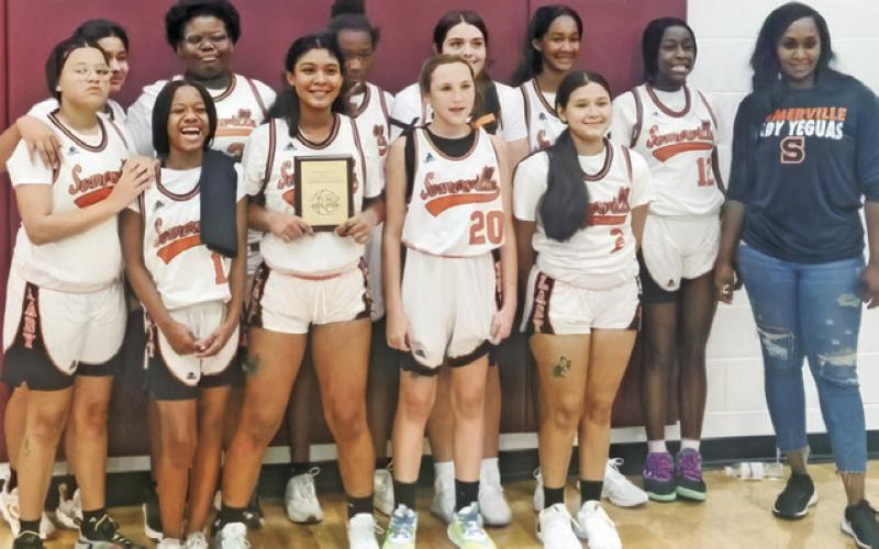 THE SOMERVILLE LADY YEGUA Junior High School basketball team won the Hearne Eagle Junior High Tournament championship by beating Mumford in the title game 32-17.