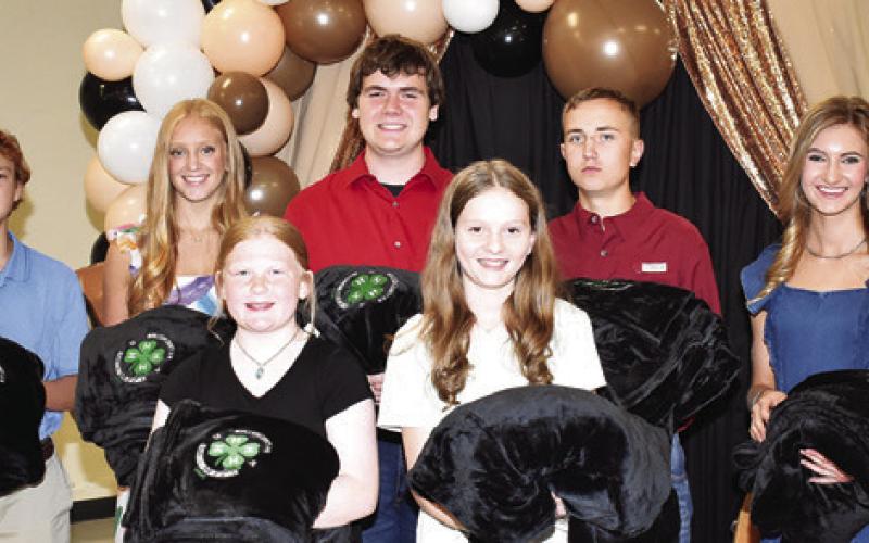 OUTSTANDING CLUB MEMBERS are, front row, Abigail Huddleston and Kathryn Schilling; back row, Barrett Warren, Caitlyn Faust, Brycen Suehs, Wesley See and Kylan Canon.