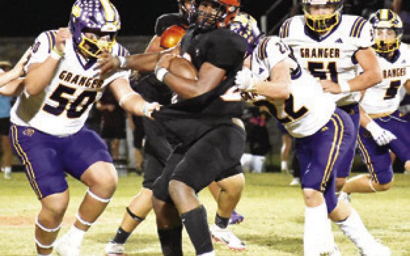 KEKE DANIELS OF Somerville carries the ball against Granger. The Yeguas won 32-15 to improve to 4-0 in district play. Tribune photo by Roy Sanders