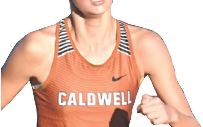 LAST SATURDAY, Caldwell High School hosted the Caldwell Cross Country Invitational at Davidson Creek Park. Pictured, from left, are Gezlynn Wolfe, Isabel Alcocer and Ra’Maya Carter.