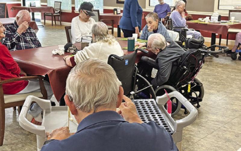 RESIDENTS OF COPPERAS Hollow Nursing Home play Bingo, hosted by the Caldwell Burleson County Lions Club each month. Photo courtesy of Lions club
