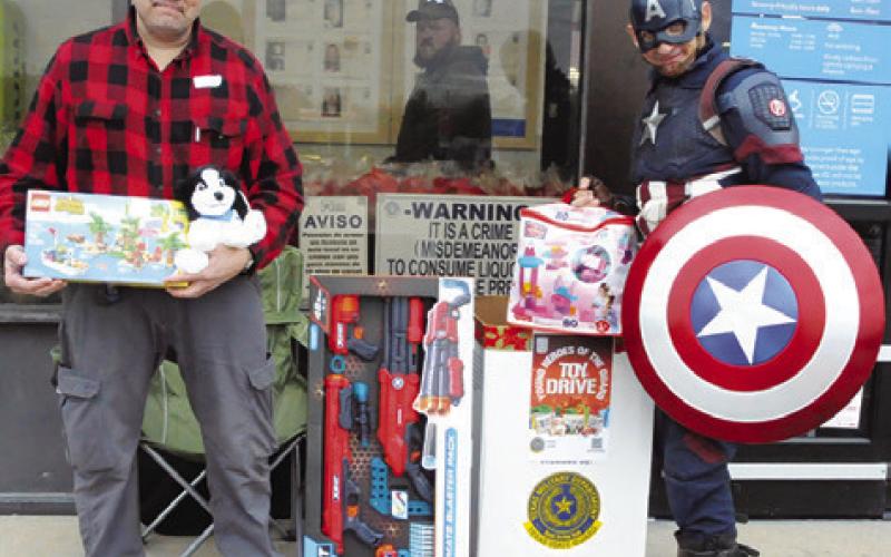 CAPTAIN AMERICA AND OTHERS from the Texas State Guard were collecting toys in front of Walmart on Sunday for the Young Heroes of the Guard’s annual toy drive. Monetary donations towards the drive are still being collected by sending a check to: Texas Toy Drive, Young Peoples Heroes of the Guard, P.O. Box 5218, Austin, Texas 78763-5218. Tribune photo by Denise Squier