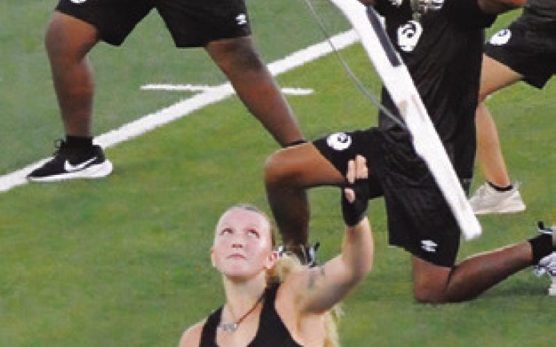 DRUM CORPS International’s Genesis performed at Hornet Field last Saturday night.