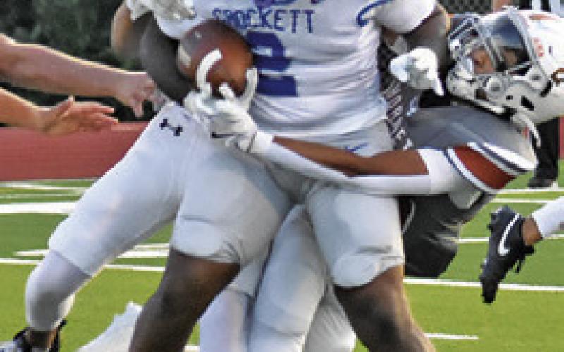 JADEN HAGEN of Caldwell makes a tackle against Crockett. Tribune photo by Roy Sanders