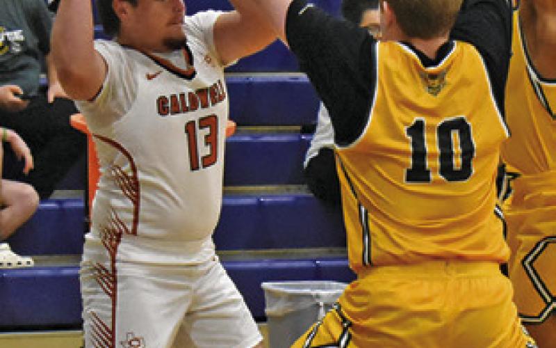 LEVI KELLY of Caldwell gets ready to pass against Little River-Academy. Tribune photo by Roy Sanders