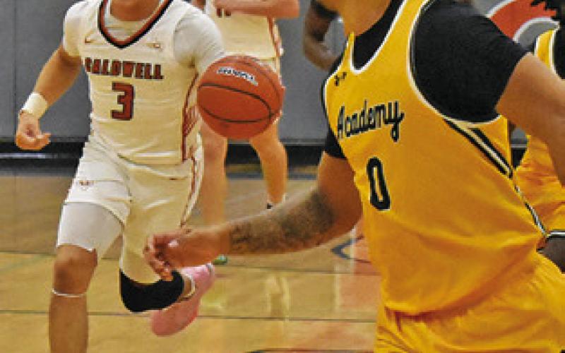 CALDWELL’S KORBIN Burns moves the ball down court against Little River-Academy. Tribune photo by Roy Sanders