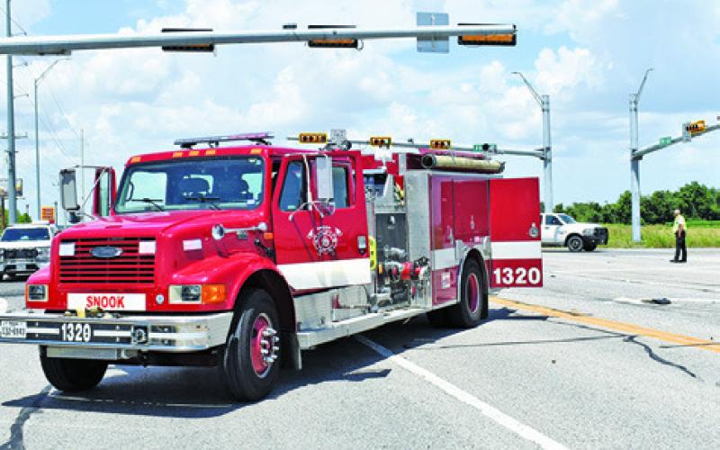 THE SNOOK VOLUNTEER Fire Department responded to this fatal accident on Thursday, July 2, at F.M. 60 and F.M. 50. Tribune photo by Roy Sanders