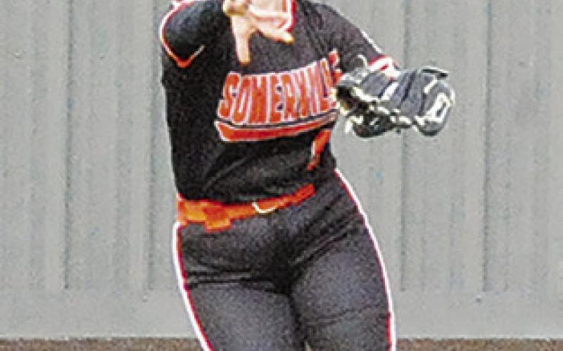 JALYNN URBANOSKY throws the ball from the outfield during the Somerville-Giddings tournament game last Thursday in Thrall.