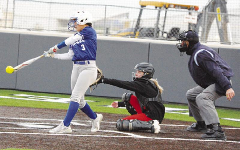 SNOOK’S MARISSA BATISTE hits the ball foul during the Lady Jays’ game against Burton last week in Thrall. -- Tribune photo by Denise Squier