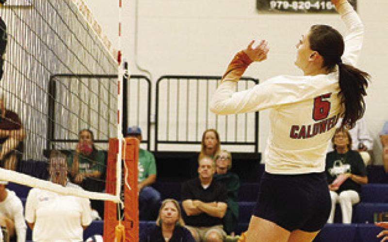 CALDWELL’S KAELY Brown attacks from the middle during a match at the Huntsville Volleyball Tournament last week. Photo courtesy of Casey Faske