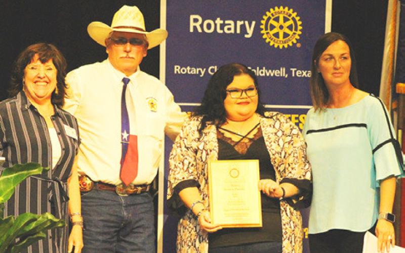 BURLESON COUNTY DISPATCHER Jessica Pineda was named the “Support Person on the Year” during the Law Enforcement Appreciation Banquet. Pictured with Pineda are Rotary President Lia Zaccagnino, Sheriff Gene Hermes and Dispatch Supervisor Nicole Colley. Photo courtesy of Cathy Hutcheson