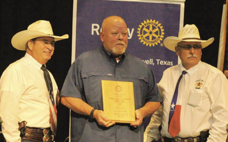BURLESON COUNTY DEPUTY Daniel Leschber was honored with the “Service Above Self” award during the Law Enforcement Appreciation Banquet last Friday. Pictured with Leschber are Chief Deputy Bill Rios and Sheriff Gene Hermes. Photo courtesy of Cathy Hutcheson