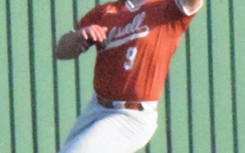 HAYDEN VOLLENTINE makes one of several catches near the outfield fence during Game 2 of the Caldwell-Troy playoff series last week.
