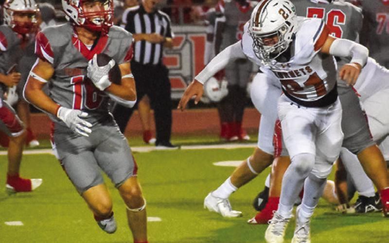 GUS NAQUIN MOVES in for a tackle against Bellville last Friday. Tribune photo by Roy Sanders