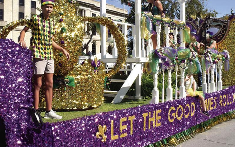 HADLEIGH NOVOSAD WON FIRST place in the Queen’s Category at last Saturday’s Burleson County Fair Parade. She also won the “People’s Choice Award” for favorite queen float. See story inside. Tribune photo by Roy Sanders