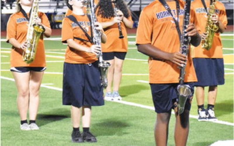 CALDWELL HIGH SCHOOL band members perform at halftime of the Caldwell-Robinson football game. -- Tribune photo by Roy Sanders