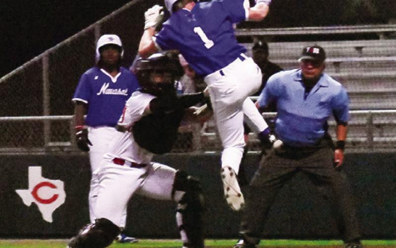 JAKE HIBBELER OF Caldwell tags this Navasota player at home plate. The Hornets lost their district opener 5-2. Tribune photo by Roy Sanders