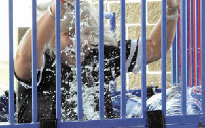 CALDWELL MAYOR JANICE EASTER volunteered to sit in the dunk tank at last Thursday’s special event sponsored by the Harrie P. Woodson Memorial Library at Davidson Creek Park.